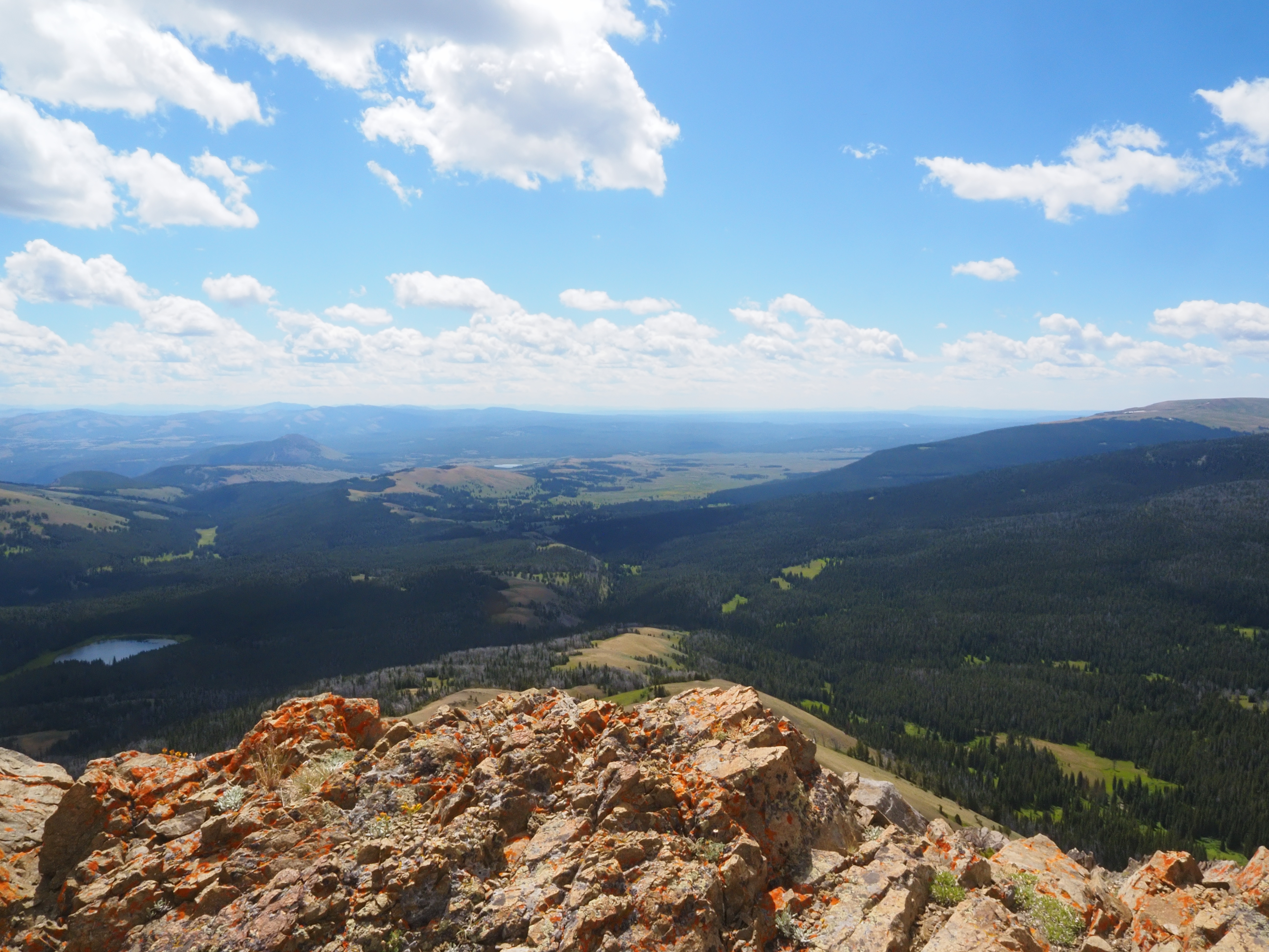 A photo of a view from a mountain peak